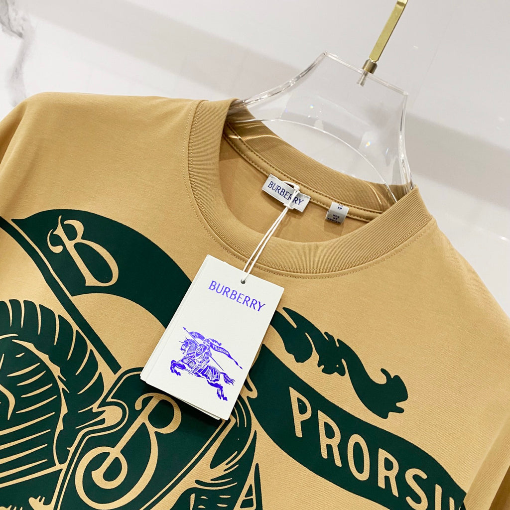 Burberry yellow T-shirt with green graphic text and hanging brand tag