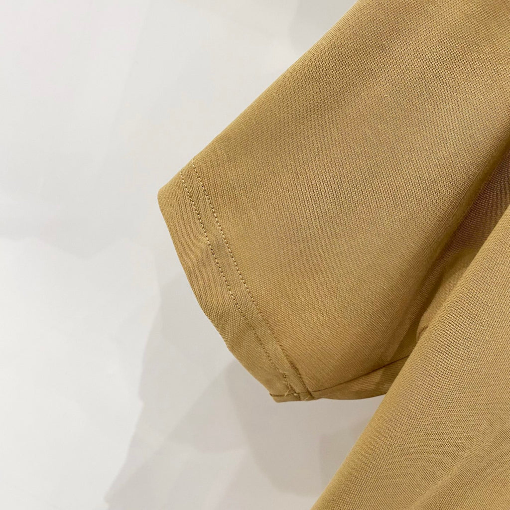 Burberry yellow T-shirt sleeve hem and stitched cuff