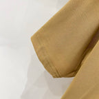 Burberry yellow T-shirt sleeve hem and stitched cuff