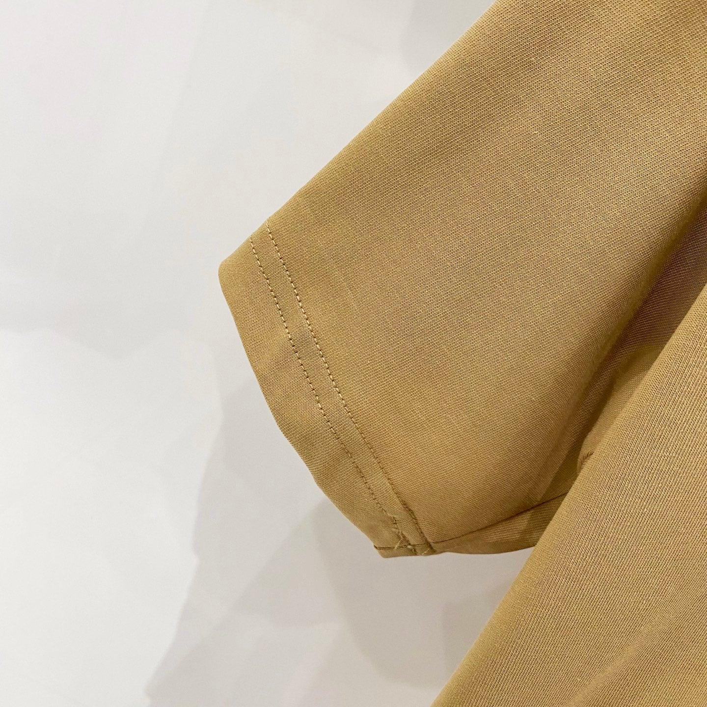 Burberry yellow T-shirt sleeve hem and stitched cuff