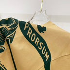 Burberry yellow T-shirt with green PRORSUM band across shoulder