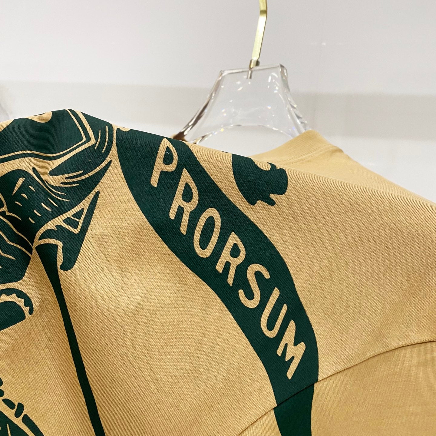 Burberry yellow T-shirt with green PRORSUM band across shoulder