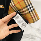 Check sleeve and fabric care label on black T-shirt