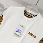 White T-shirt with Burberry plaid inner neckline and logo patch on chest