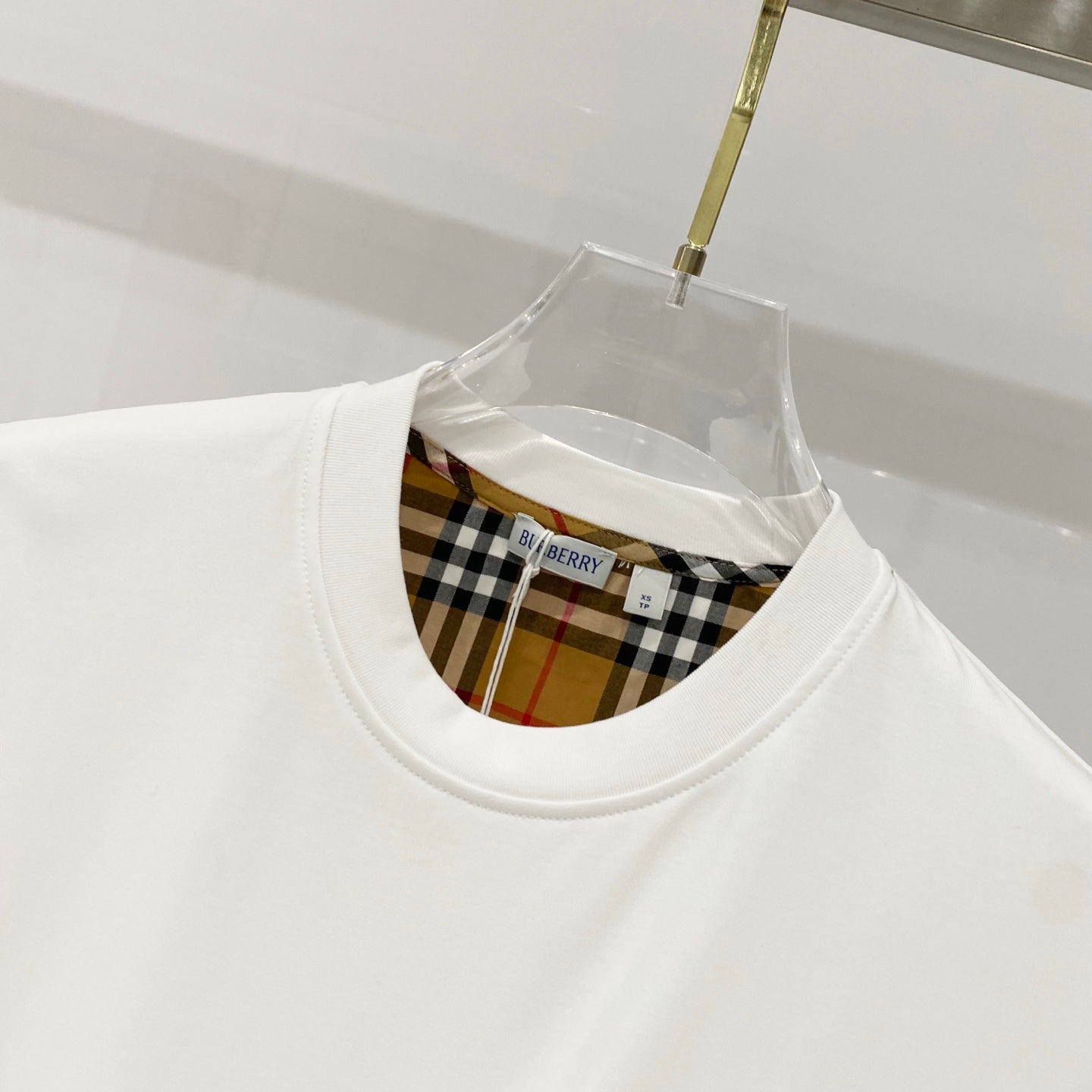 White crew-neck T-shirt with Burberry plaid check inner neckline