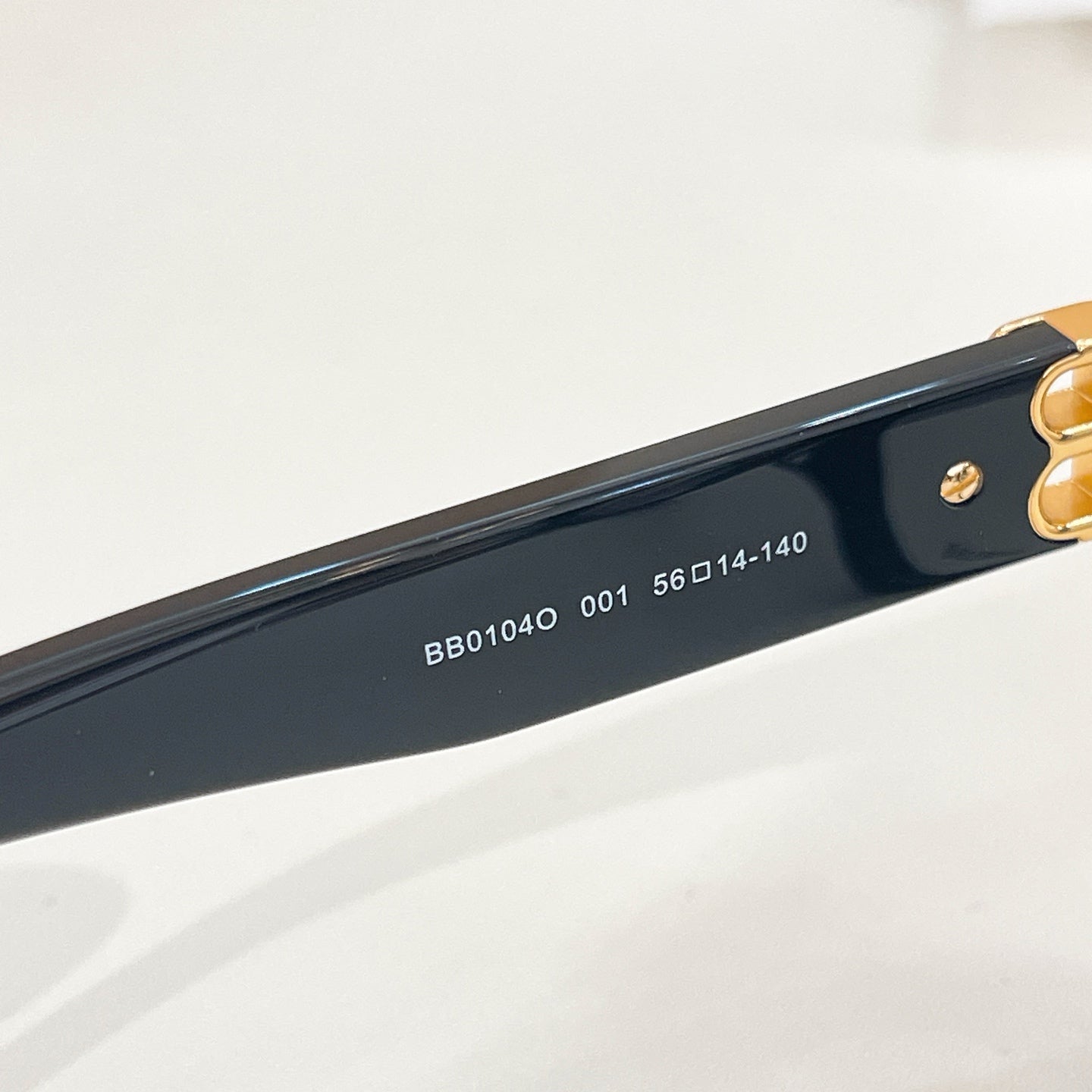 Balenciaga eyeglasses temple arm text: BB01040 001 56□14-140