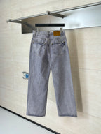 Light blue denim pants with waistband and two back pockets, hanging display