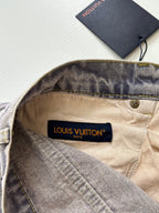 Denim pants interior with Louis Vuitton label and button at waistband