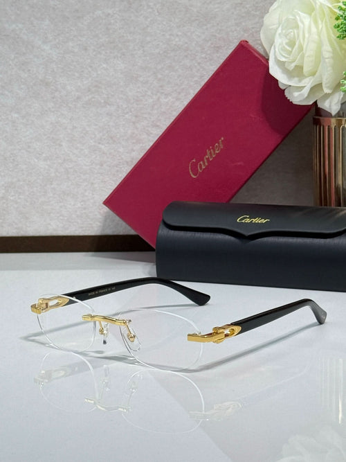Cartier eyeglasses with clear lenses, gold hinge details, and dark temple tips