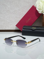 Cartier eyeglasses with blue lenses, gold bridge, and dark temple arms