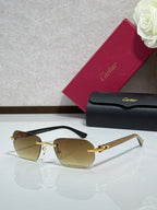 Cartier glasses with tortoiseshell frame, gold details, and amber tinted lenses