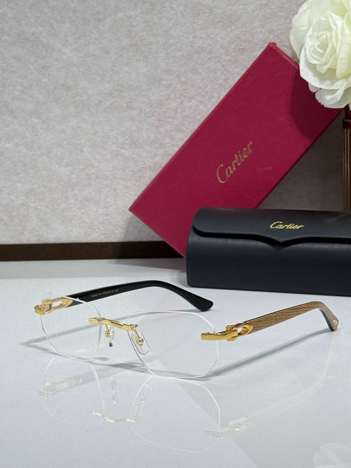Cartier glasses with black frame, gold details, and clear lenses