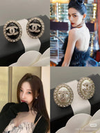 Round CC logo stud earrings with crystal halos in black and gold, worn on models