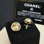 Chanel stud earrings, round metal with engraved logo detail