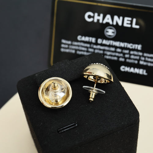 Chanel stud earrings, round metal with engraved logo detail