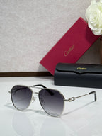Cartier round-frame sunglasses with silver frame and dark gray lenses