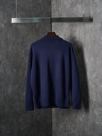 Navy knit cardigan on hanger, crew neckline ribbed hem and cuffs with full back view