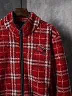 Red plaid Burberry jacket with zip front and embroidered logo patch