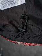 Black inner hood/lining with drawcord and Burberry brand tag