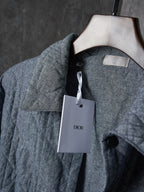 Dior long quilted jacket with inner neck label and white shopping tag