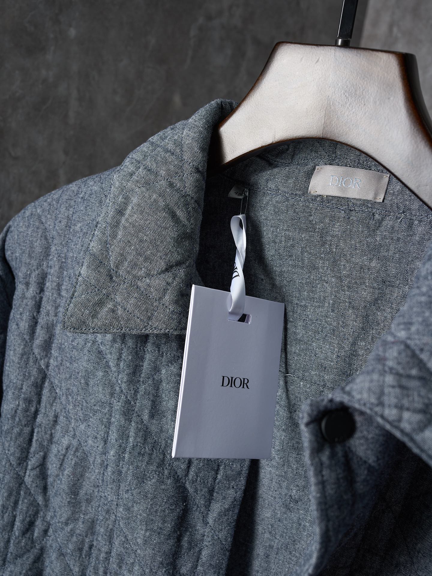 Dior long quilted jacket with inner neck label and white shopping tag