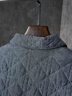 Dior long quilted jacket, blue-gray, back view with raised collar
