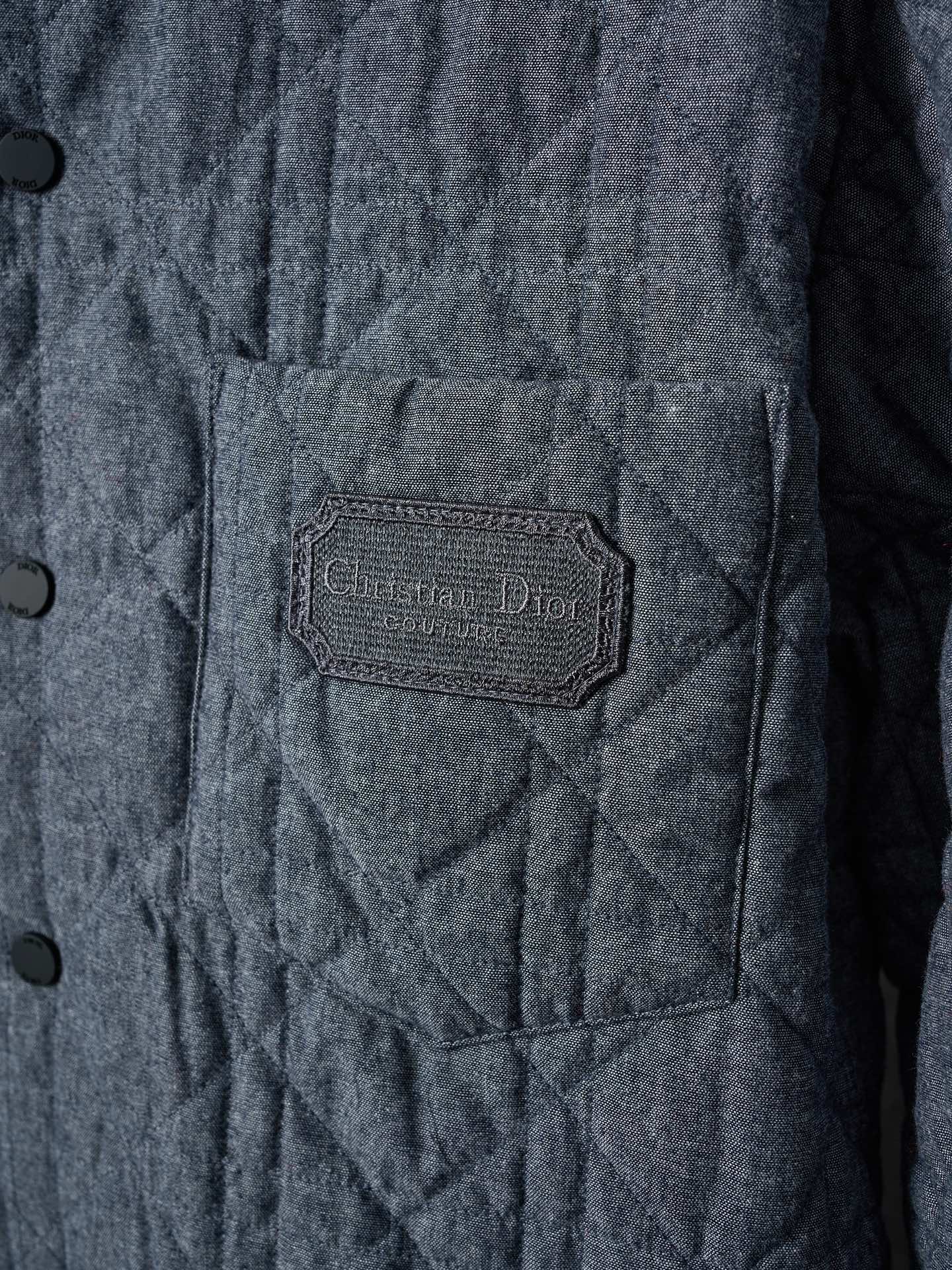 Dior quilted jacket chest pocket with branded woven label patch