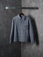 Long quilted Dior button-up jacket, blue-gray with chest pocket and collar
