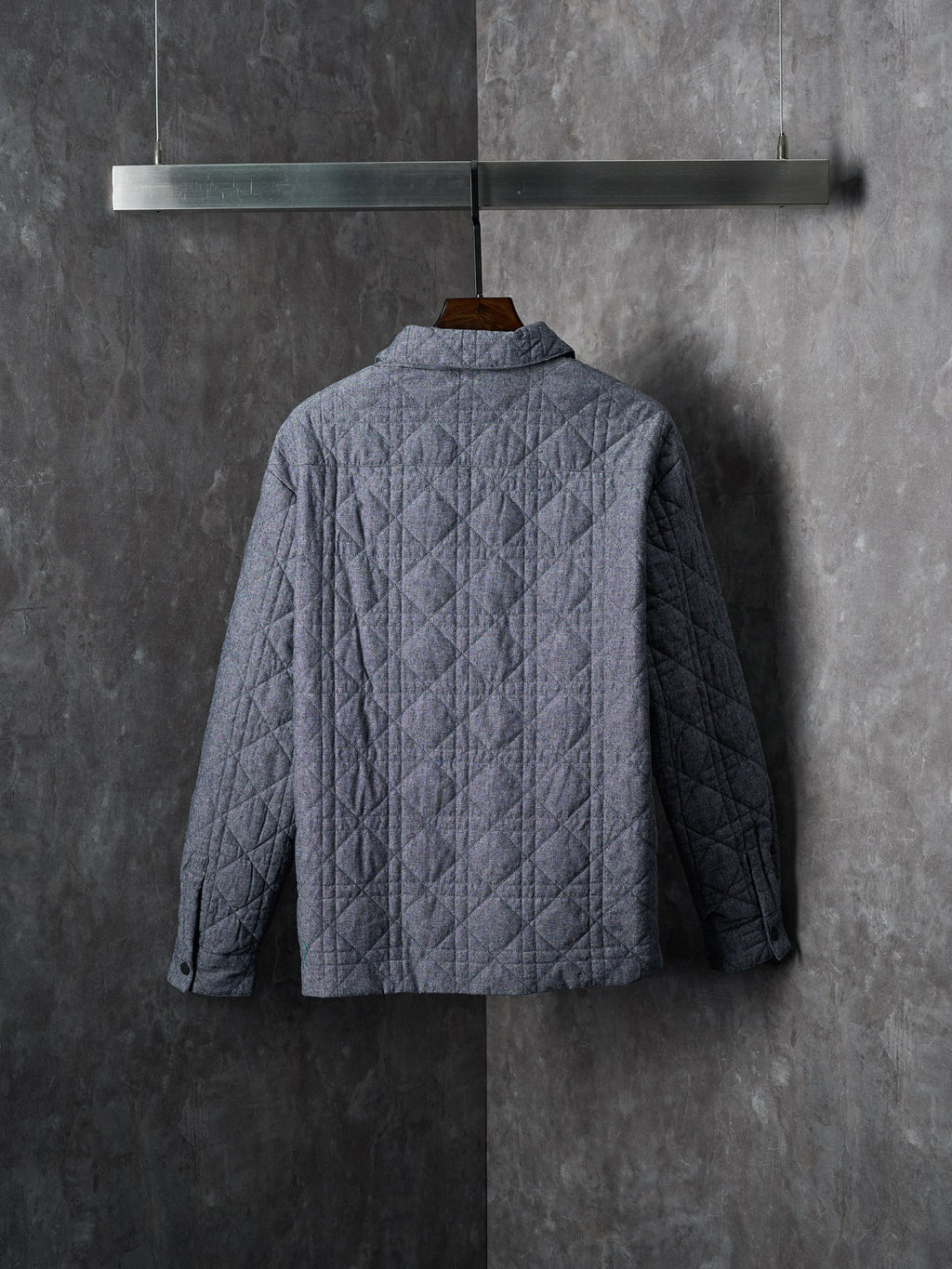 Long quilted Dior jacket, blue-gray with stand collar, back view