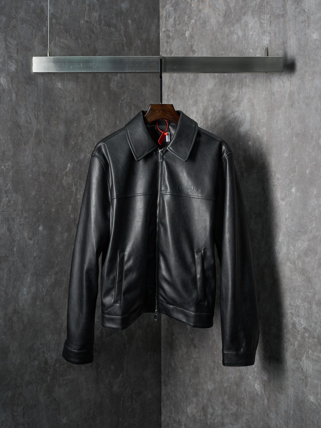 Dior black leather jacket with stand collar and front zipper closure