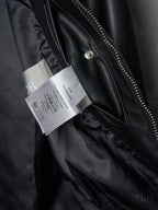 Dior black leather jacket front zipper and hangtags on inner placket