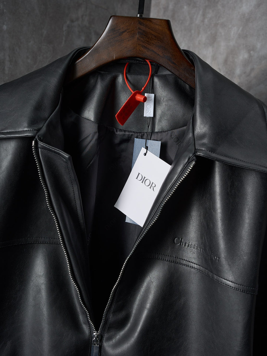 Dior black leather jacket collar and front zipper, with hangtags