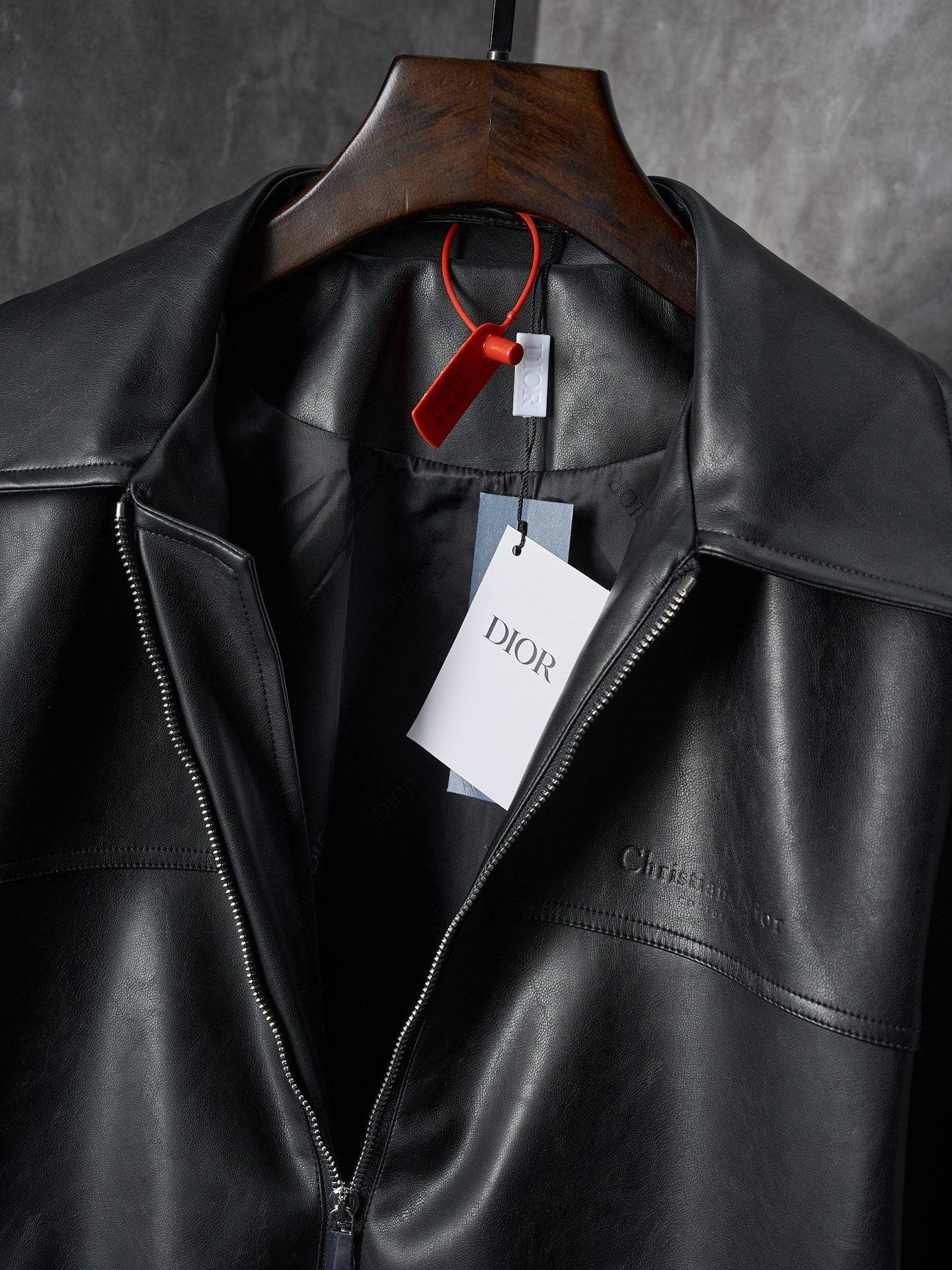 Dior black leather jacket collar and front zipper, with hangtags