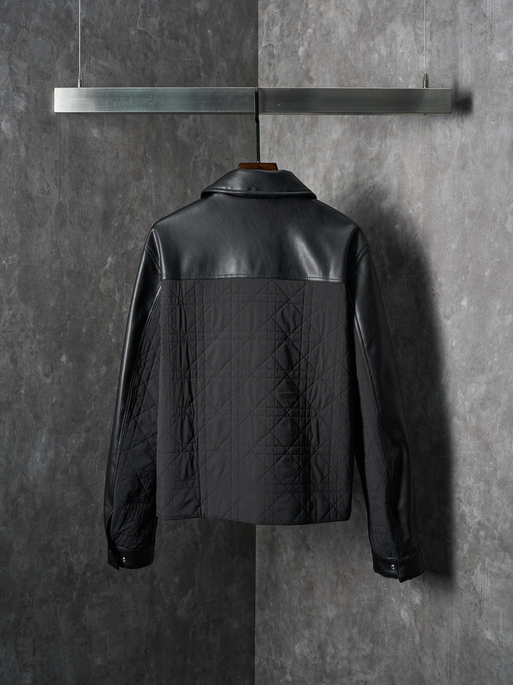 Dior black leather jacket, back view, stand collar, quilted panel detail