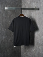 Black short-sleeve T-shirt, back view with curved hem and underlayer at bottom