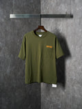 Olive green short-sleeve T-shirt with chest pocket and small logo label