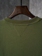 Olive green crew-neck T-shirt with stitched neckline detail