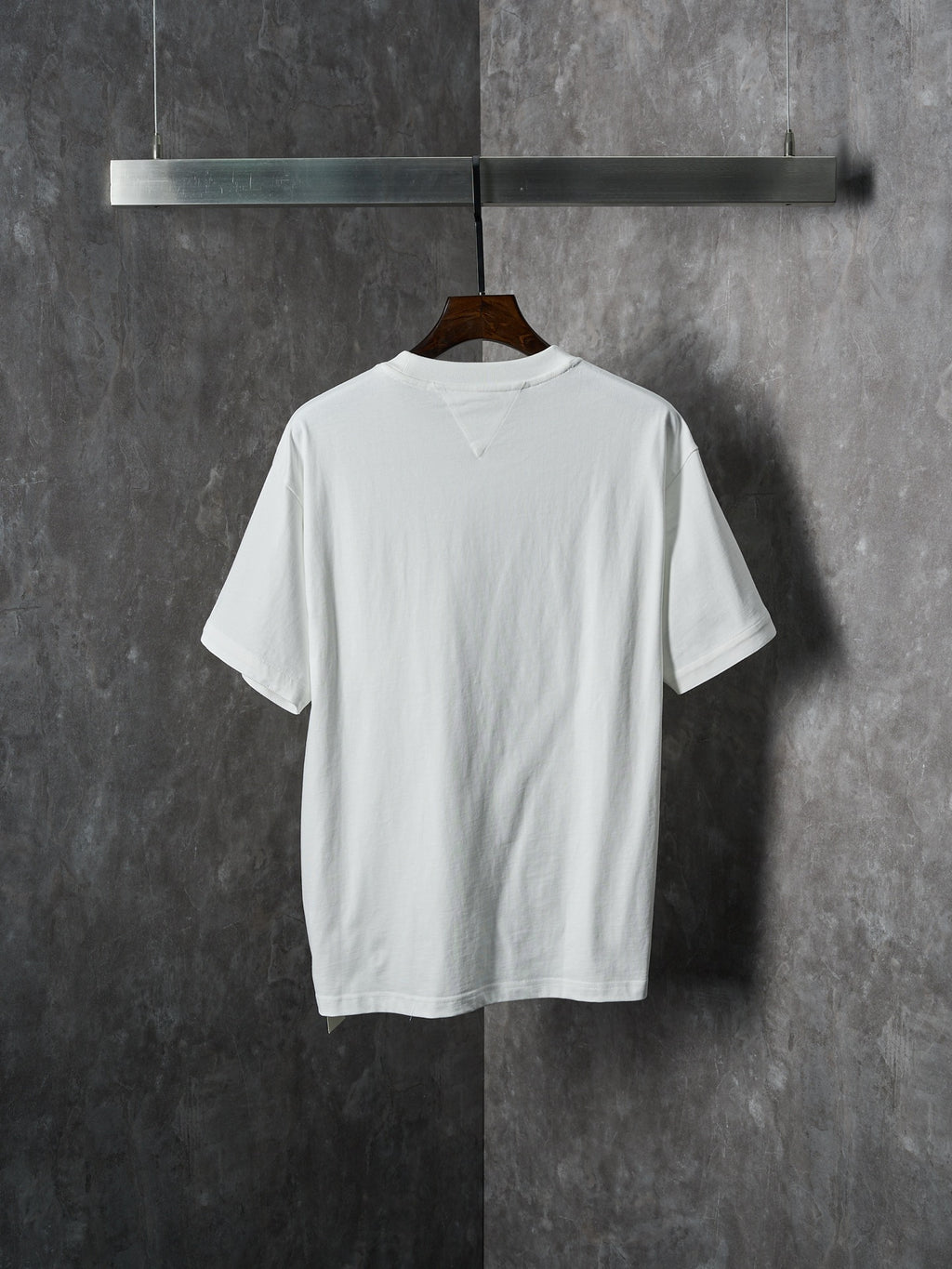 Off-white T-shirt with crew neck, short sleeves, and plain back view