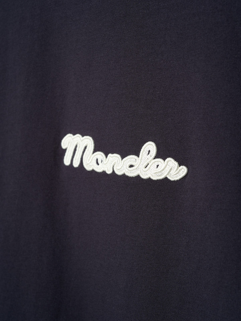 Navy T-shirt with white Moncler script logo