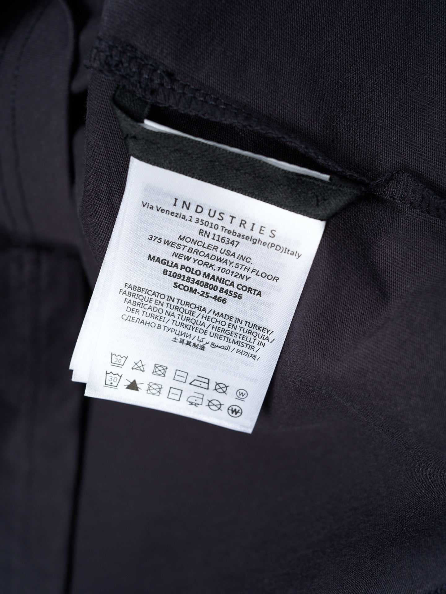 Navy T-shirt interior care label