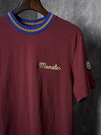 Burgundy short-sleeve T-shirt with embroidered chest logo and sleeve badge