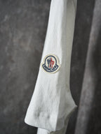 White Moncler T-shirt sleeve with circular logo patch
