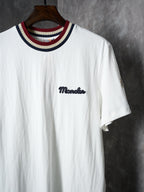 White Moncler T-shirt with embroidered script logo on chest and striped collar