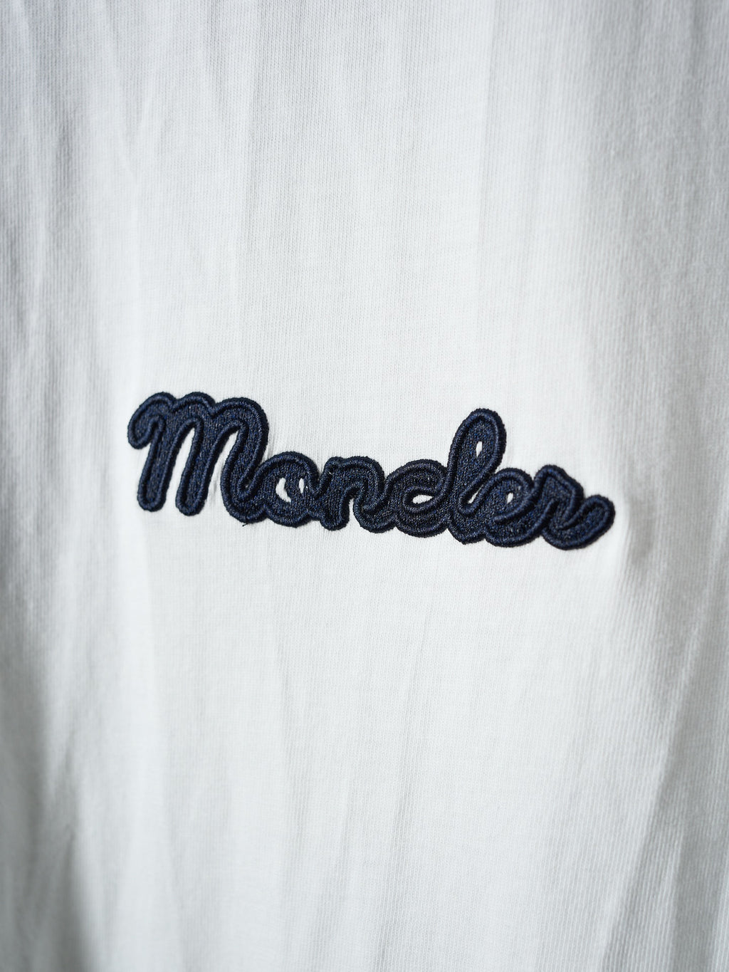 White Moncler T-shirt with navy embroidered script logo