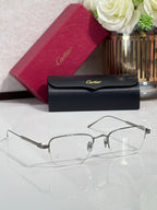 Clear-lens eyeglasses with silver metal frames and rectangular lenses
