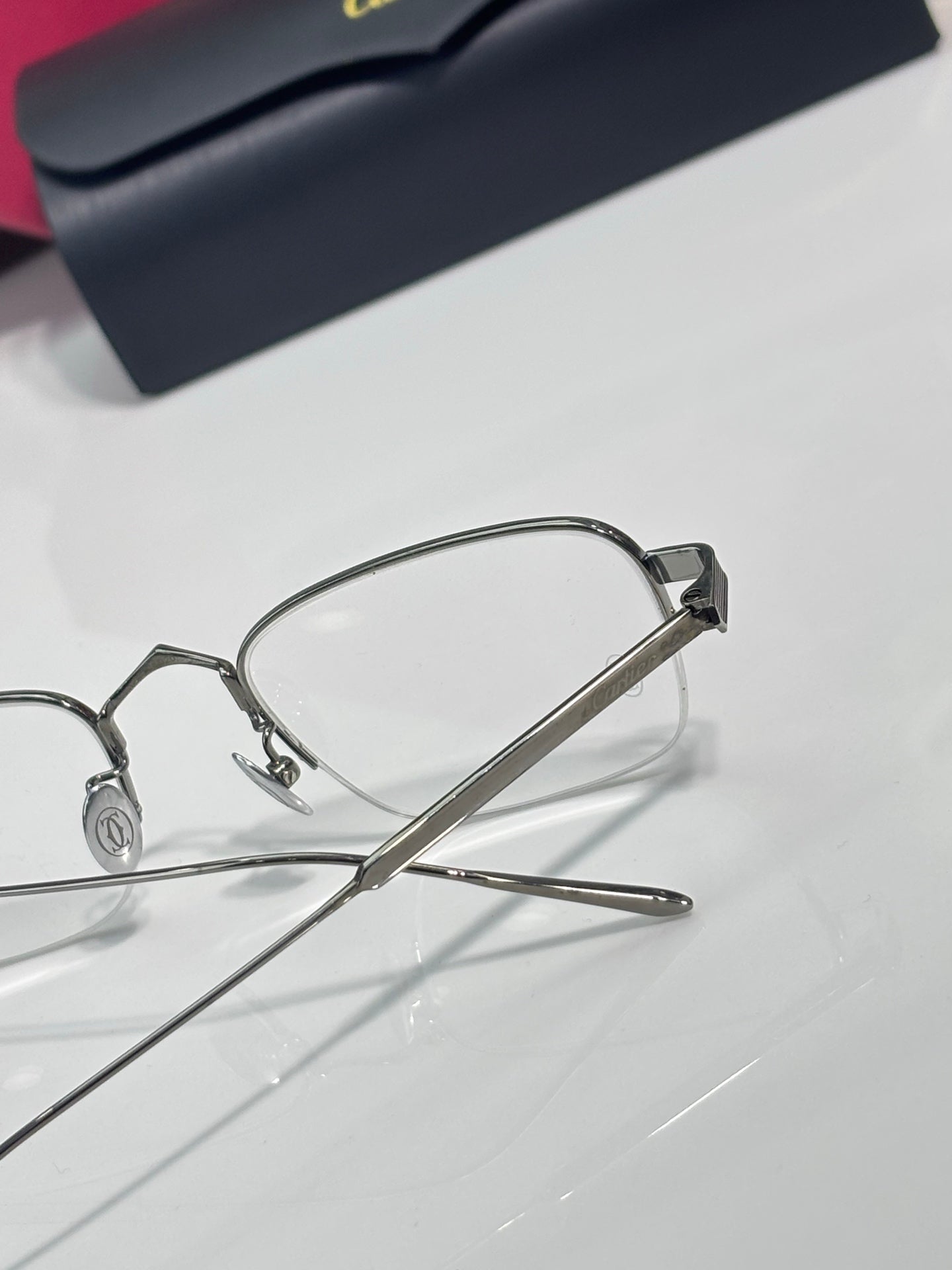 Clear-lens eyeglasses close-up with silver metal temples