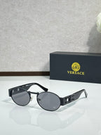 Versace round sunglasses with black frame and dark gray lenses