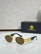 Versace round sunglasses with gold frame and dark brown lenses, double bridge