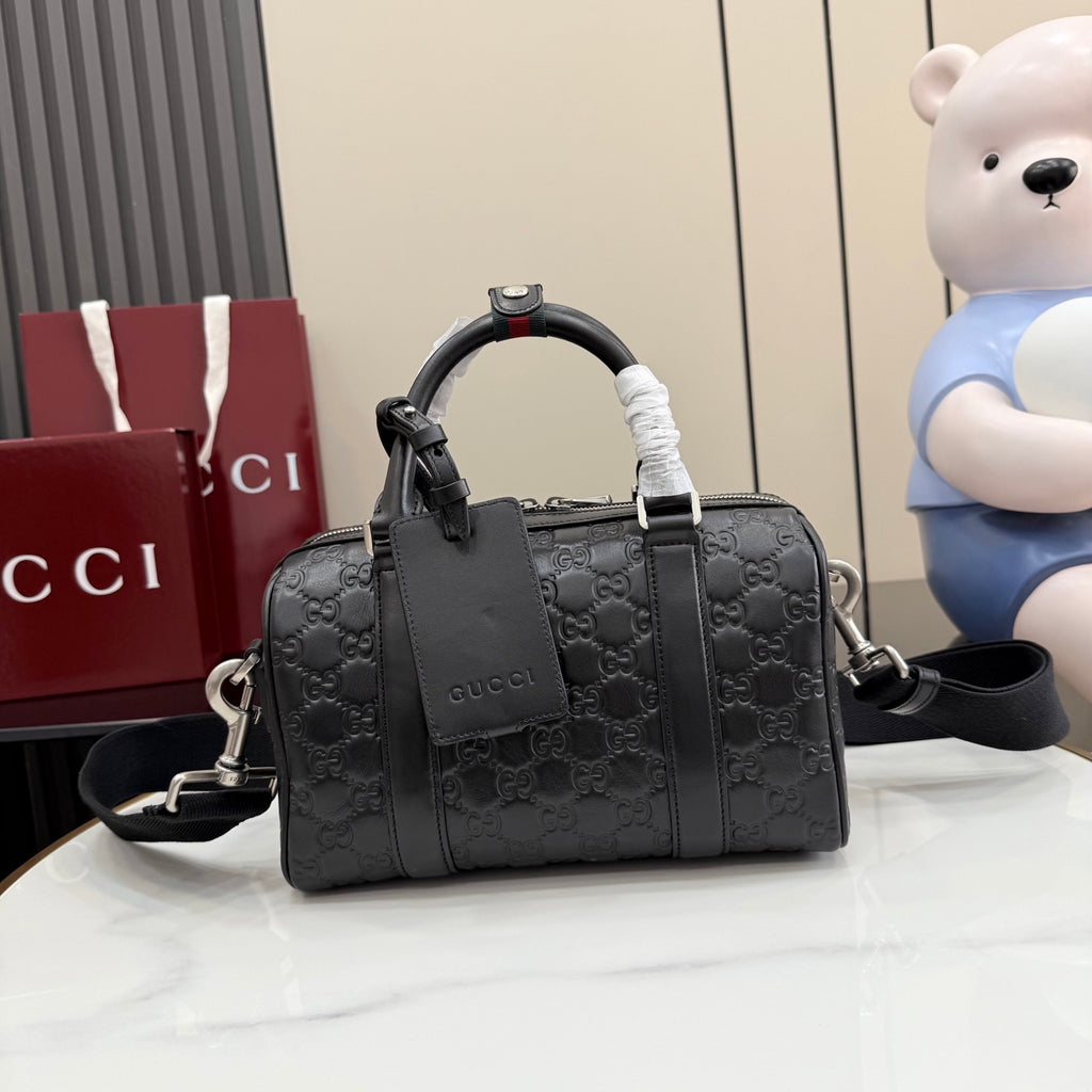 Gucci structured handbag in dark gray with GG monogram embossing and top handles