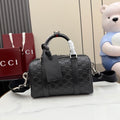 Gucci structured handbag in dark gray with GG monogram embossing and top handles